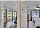 Hallway view shows access to bedroom with balcony and another bedroom at 1849 Bough Ave # D, Clearwater, FL 33760