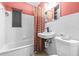 Simple bathroom with a bathtub, sink, and toilet at 1907 27Th W St, Bradenton, FL 34205