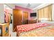 Bedroom with double bed, dresser, and TV at 1907 27Th W St, Bradenton, FL 34205