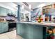 Spacious kitchen with island and decorative backsplash at 1907 27Th W St, Bradenton, FL 34205