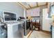 Laundry room with washer, dryer, and storage cabinets at 1907 27Th W St, Bradenton, FL 34205