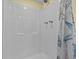 Clean shower stall with a shower curtain at 225 Country Club Dr # B121, Largo, FL 33771