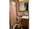 Bathroom with shower/tub combo, vanity with wood cabinet at 2504 Highland S St, St Petersburg, FL 33705