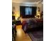 Bedroom with double bed, dark red bedding, and wood floor at 2504 Highland S St, St Petersburg, FL 33705