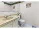 Condo bathroom with single sink vanity and toilet at 2630 Pearce Dr # 102, Clearwater, FL 33764