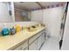 Bright bathroom with single sink vanity and bathtub at 2630 Pearce Dr # 102, Clearwater, FL 33764