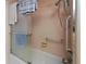 Clean bathroom with shower/tub combo and grab bars at 2630 Pearce Dr # 102, Clearwater, FL 33764