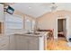 Bright kitchen features ample counter space, white cabinets, and stainless steel appliances at 3327 25Th N St, St Petersburg, FL 33713