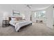 Bright bedroom with a king-size bed and neutral decor at 3616 W Morrison Ave, Tampa, FL 33629