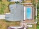 Aerial view showing house and screened-in pool at 4113 Barret Ave, Plant City, FL 33566