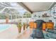 Backyard patio with pool and outdoor kitchen at 4113 Barret Ave, Plant City, FL 33566