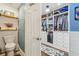 Convenient bathroom with toilet and built-in shelving at 4113 Barret Ave, Plant City, FL 33566