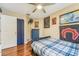 Charming bedroom with a full-size bed and wall art at 4113 Barret Ave, Plant City, FL 33566