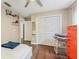 Bedroom with white closet doors and wood floors at 4113 Barret Ave, Plant City, FL 33566