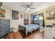 Cozy bedroom with wood floors and eclectic decor at 4113 Barret Ave, Plant City, FL 33566