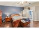 Spacious bedroom with wood flooring and built-in shelving at 4113 Barret Ave, Plant City, FL 33566
