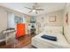 Bright bedroom with orange dresser and comfortable bed at 4113 Barret Ave, Plant City, FL 33566