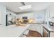 Updated kitchen with granite countertops, stainless steel appliances, and a spacious layout at 4113 Barret Ave, Plant City, FL 33566