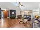 Open living space with hardwood floors and vaulted ceiling at 4113 Barret Ave, Plant City, FL 33566