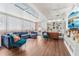 Spacious living room with built-in shelving and hardwood floors at 4113 Barret Ave, Plant City, FL 33566
