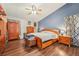 Large main bedroom with wood floors and plenty of closet space at 4113 Barret Ave, Plant City, FL 33566