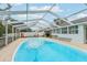 Refreshing screened-in pool in backyard at 4113 Barret Ave, Plant City, FL 33566