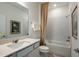 Clean bathroom featuring a shower/tub combo and white subway tile at 4176 Feldspar Ln, Spring Hill, FL 34609