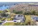 Lakefront property with spacious backyard and lush landscaping at 4825 Scott Rd, Lutz, FL 33558