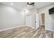 Bedroom with double doors to closet and pool view at 4825 Scott Rd, Lutz, FL 33558