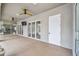 Spacious covered patio with access to the pool and main house at 4825 Scott Rd, Lutz, FL 33558