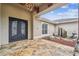 Elegant entryway with double doors and a stone floor at 4825 Scott Rd, Lutz, FL 33558