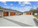 Two car garage with modern wood accents at 4825 Scott Rd, Lutz, FL 33558