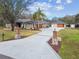 Luxury home with expansive driveway and attached garage at 4825 Scott Rd, Lutz, FL 33558