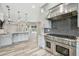 Modern kitchen with stainless steel appliances and a view of the pool at 4825 Scott Rd, Lutz, FL 33558