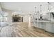 Modern kitchen with stainless steel appliances and gray cabinetry at 4825 Scott Rd, Lutz, FL 33558