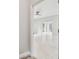 View of the open living space showcasing tile flooring at 4825 Scott Rd, Lutz, FL 33558