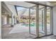Resort-style pool with expansive screened enclosure at 4825 Scott Rd, Lutz, FL 33558