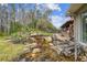Relaxing water feature with a pond and natural rock landscaping at 4825 Scott Rd, Lutz, FL 33558