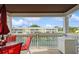 Waterfront balcony with seating area, offering scenic views at 5005 Coquina Key Se Dr # E, St Petersburg, FL 33705