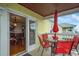 Balcony with view of dining room and marina at 5005 Coquina Key Se Dr # E, St Petersburg, FL 33705
