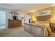 Bright bedroom with wood bed frame and built-in window seat at 5005 Coquina Key Se Dr # E, St Petersburg, FL 33705