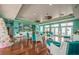 Bright and airy community room with hardwood floors at 5005 Coquina Key Se Dr # E, St Petersburg, FL 33705