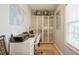 Bright home office with ample storage and window light at 5005 Coquina Key Se Dr # E, St Petersburg, FL 33705