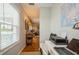 Home office features a work desk, printer and natural light at 5005 Coquina Key Se Dr # E, St Petersburg, FL 33705