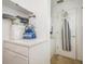Bright laundry room with built-in shelving and storage at 5005 Coquina Key Se Dr # E, St Petersburg, FL 33705