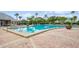 Inviting community pool with surrounding patio at 5005 Coquina Key Se Dr # E, St Petersburg, FL 33705