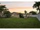 Spacious backyard with a large grassy area at 7698 Cardiff Ct, St Petersburg, FL 33709