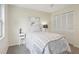 Charming bedroom with a double door closet and window at 7698 Cardiff Ct, St Petersburg, FL 33709