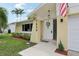 House exterior featuring a front door and walkway at 7698 Cardiff Ct, St Petersburg, FL 33709