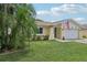 Inviting home exterior with a two-car garage at 7698 Cardiff Ct, St Petersburg, FL 33709